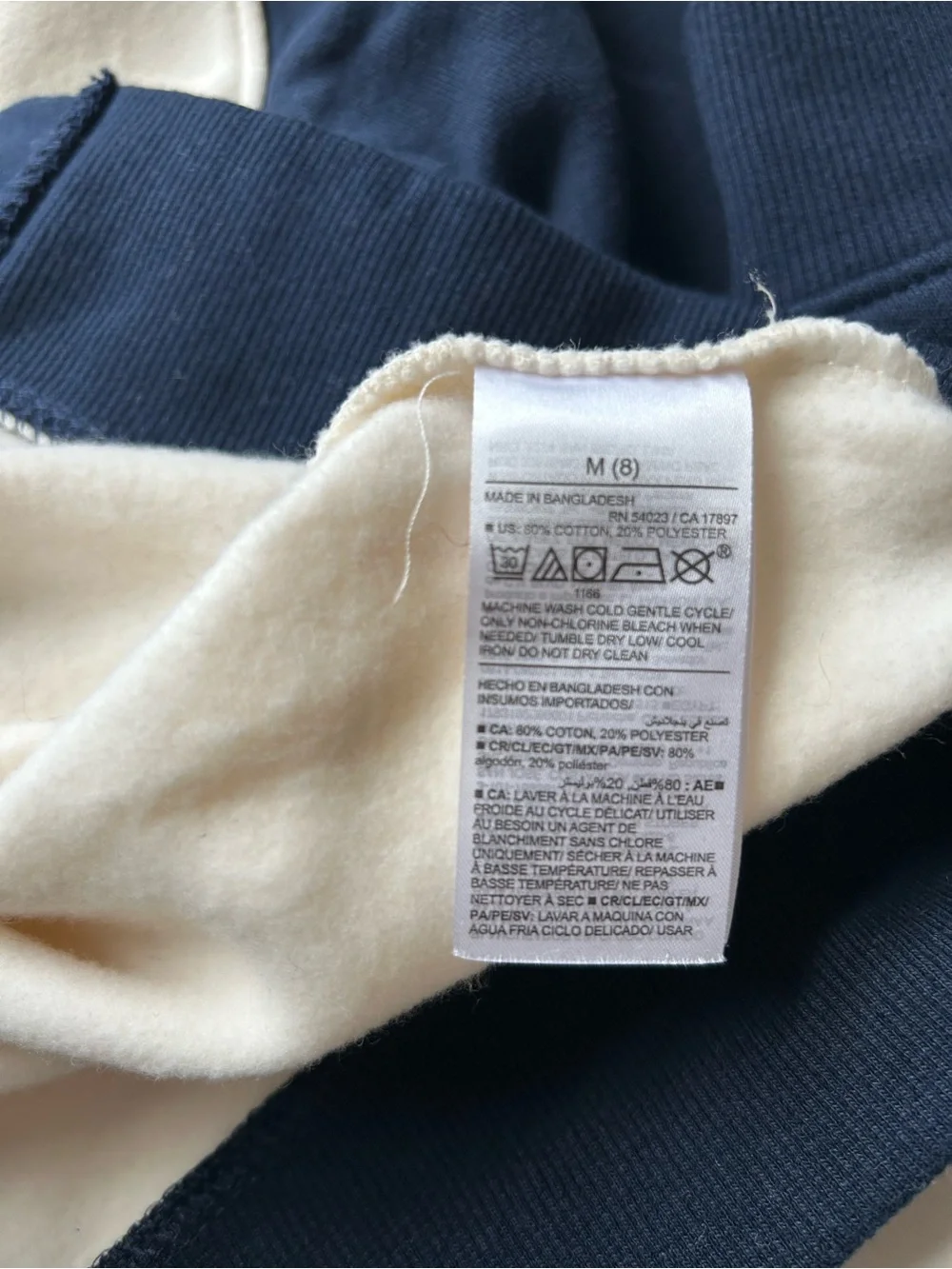 Kid’s Y2K-Inspired Two-Tone Navy and Cream Cardigan Sweater
